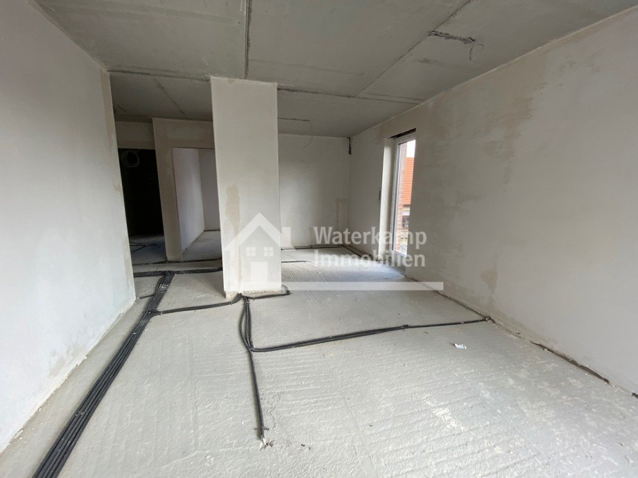 Wohnzimmer Blick zur K�che Etagenwohnung Laer