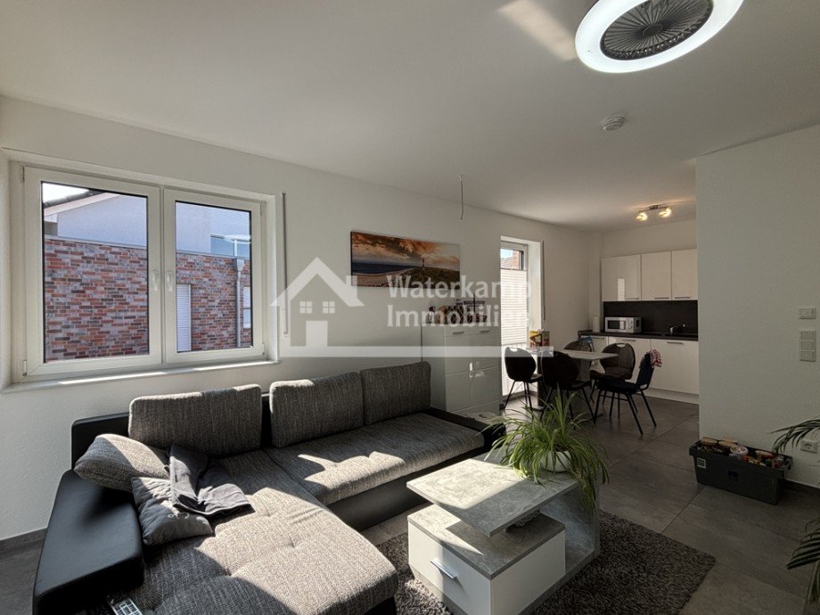 Wohnzimmer mit Blick zur K�che Etagenwohnung Laer