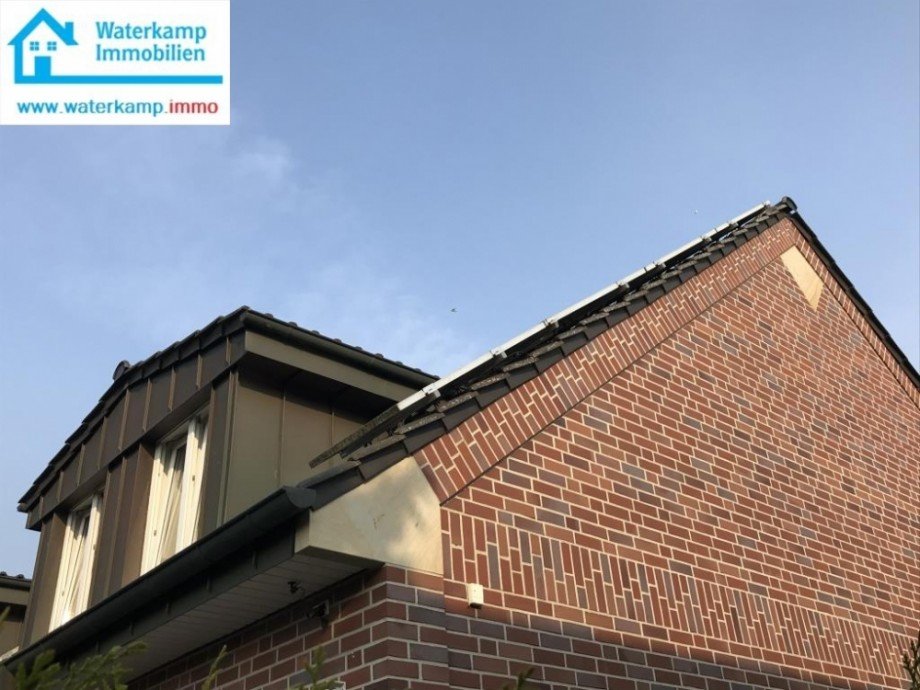 Giebelansicht mit Ausbauten Haus Nordwalde